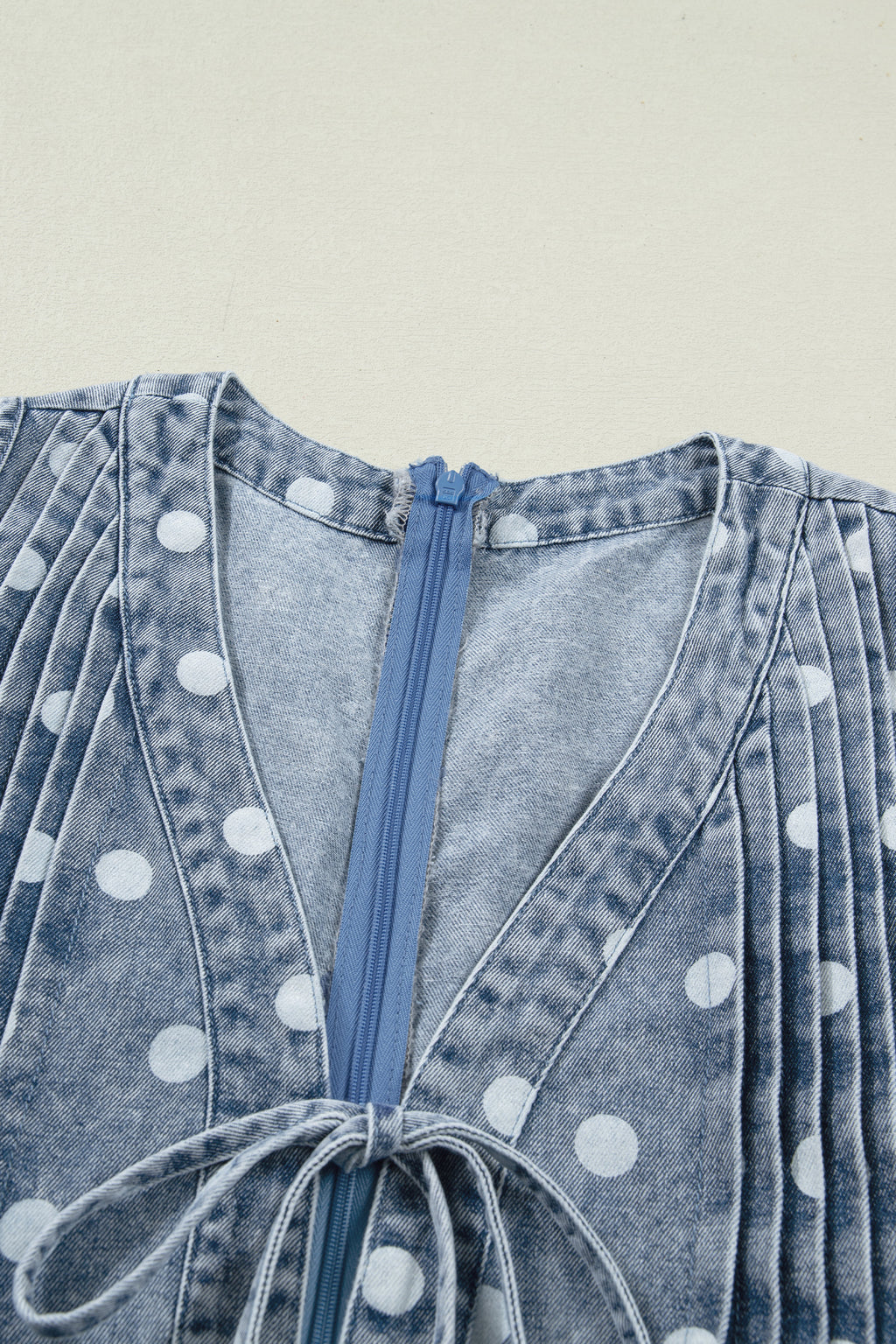 Women's Sky Blue Polka Dot Denim Romper | Tie V-Neck Pleated Loose Playsuit at LivelyLooks