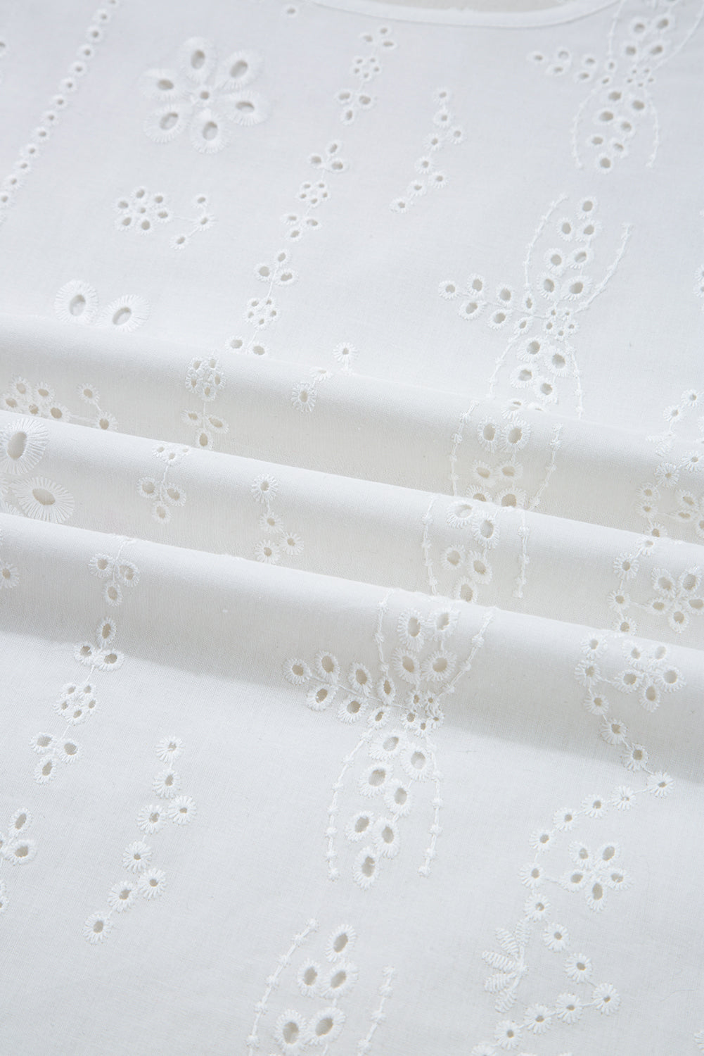 Shop White Eyelet Embroidered Smocked Cuff Sheer Blouse at LivelyLooks