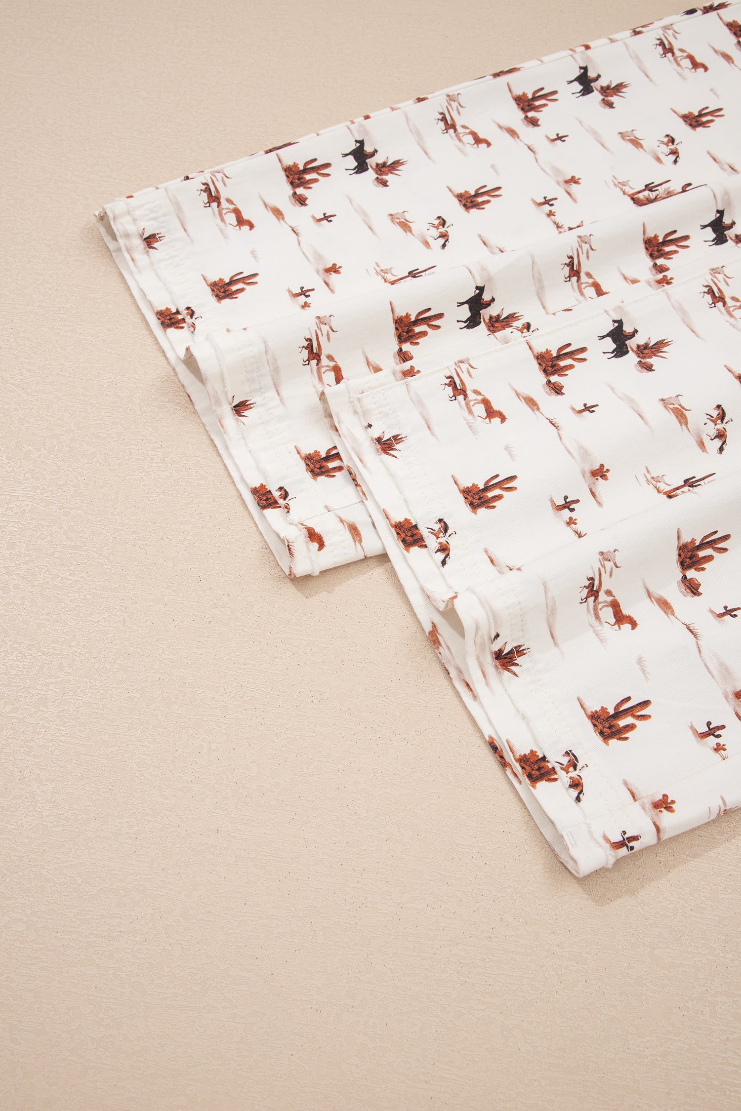 Shop Beige Western Print Adjustable Strap Loose Dungaree Jumpsuit at LivelyLooks