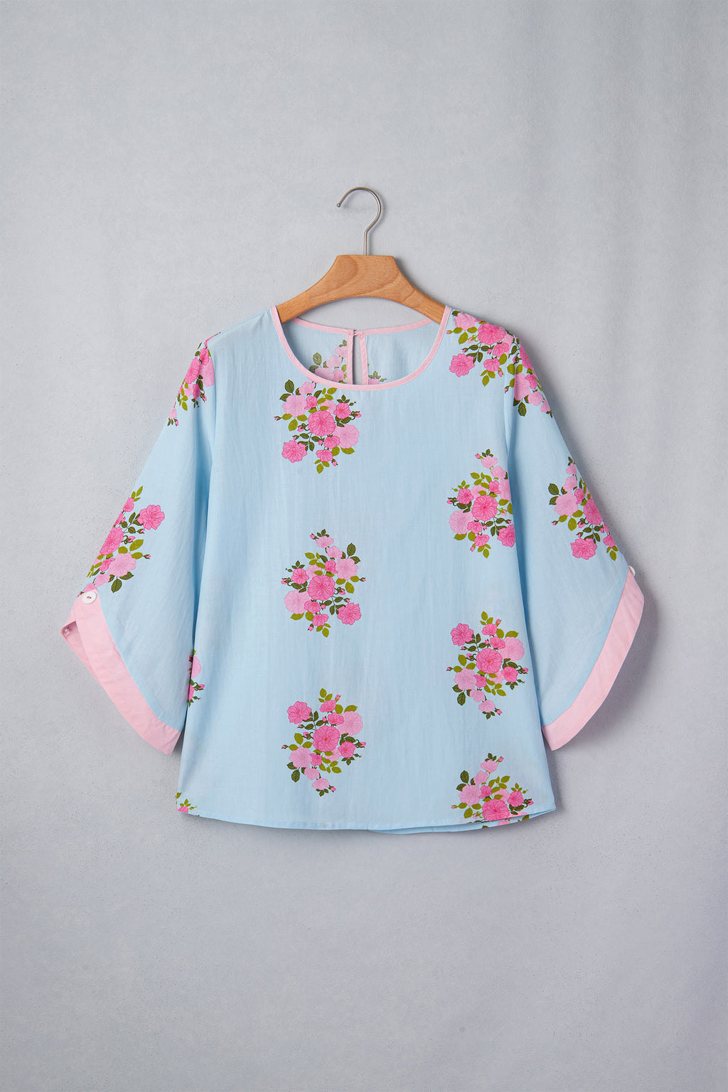 Women's Sky Blue Floral Print Button Cuff 3/4 Sleeve Round Neck Blouse at LivelyLooks