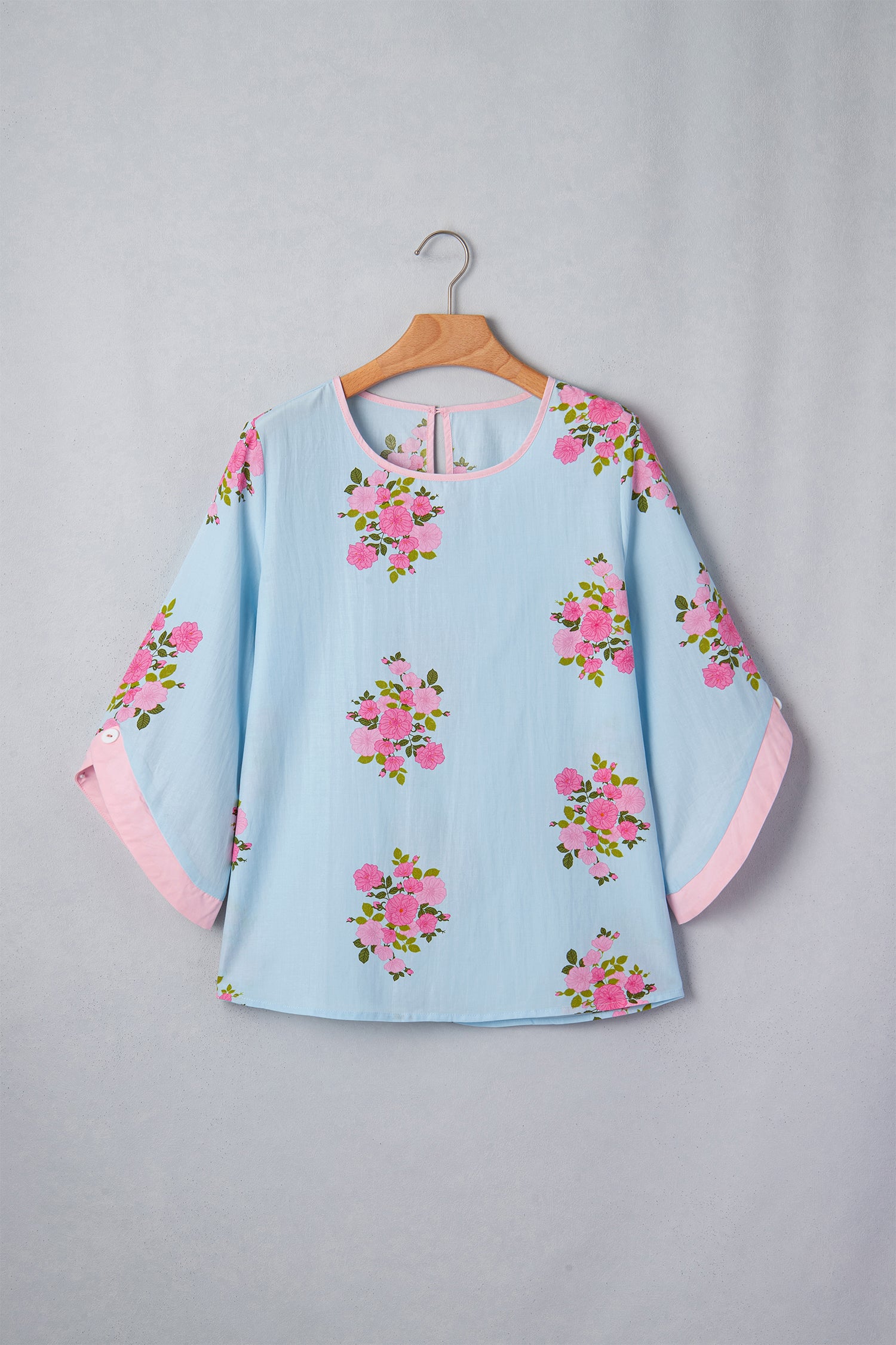 Women's Sky Blue Floral Print Button Cuff 3/4 Sleeve Round Neck Blouse at LivelyLooks