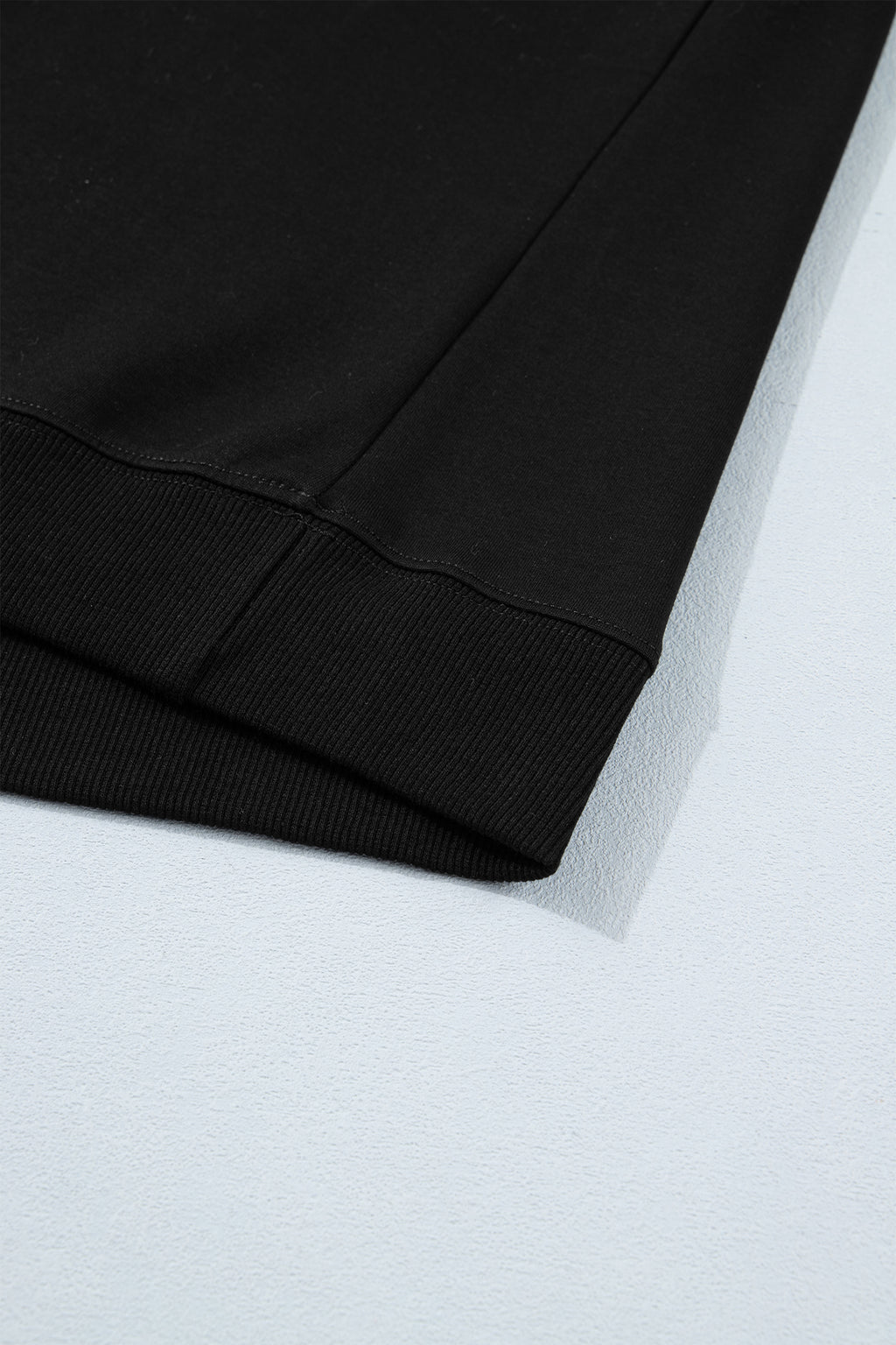Women's Black Casual Solid Short Sleeve Top with Metal Button Details at LivelyLooks