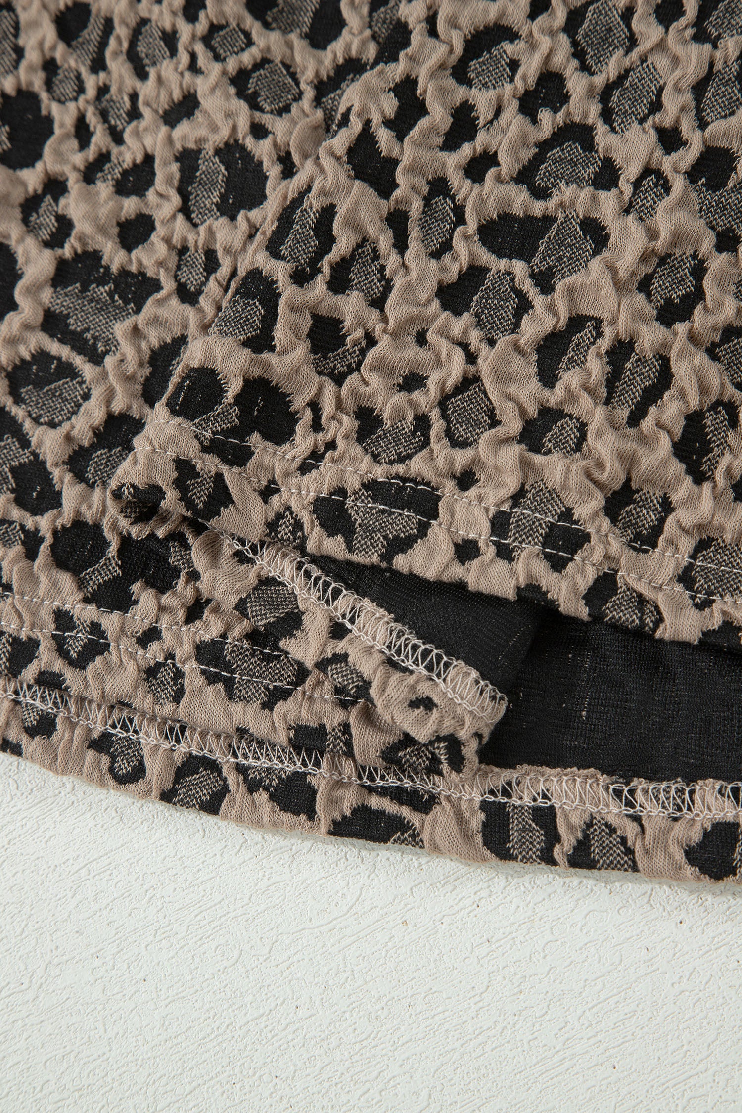 Women's Khaki Leopard Textured Sleeveless Mini Dress with Pockets at LivelyLooks