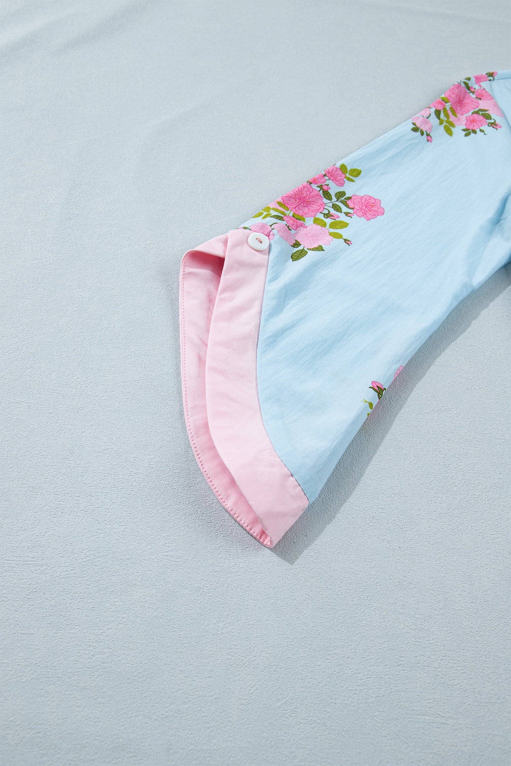 Women's Sky Blue Floral Print Button Cuff 3/4 Sleeve Round Neck Blouse at LivelyLooks
