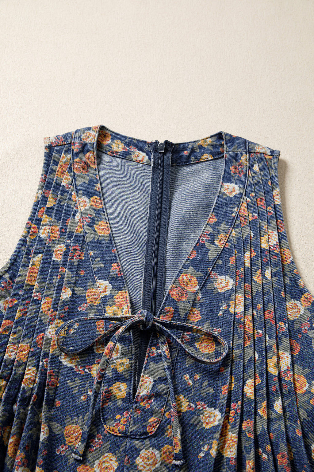 Women's Blue Retro Floral Print Bow Tie V-Neck Pleated Denim Romper at LivelyLooks