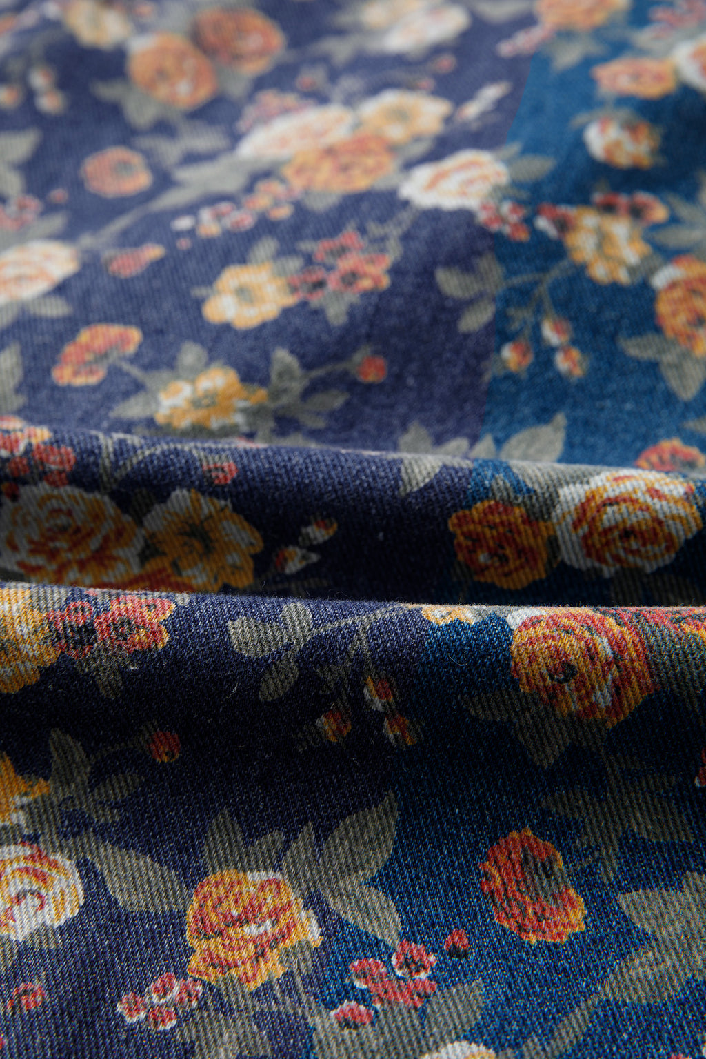 Shop Blue Retro Floral Print Bow Tie V-Neck Pleated Denim Romper at LivelyLooks