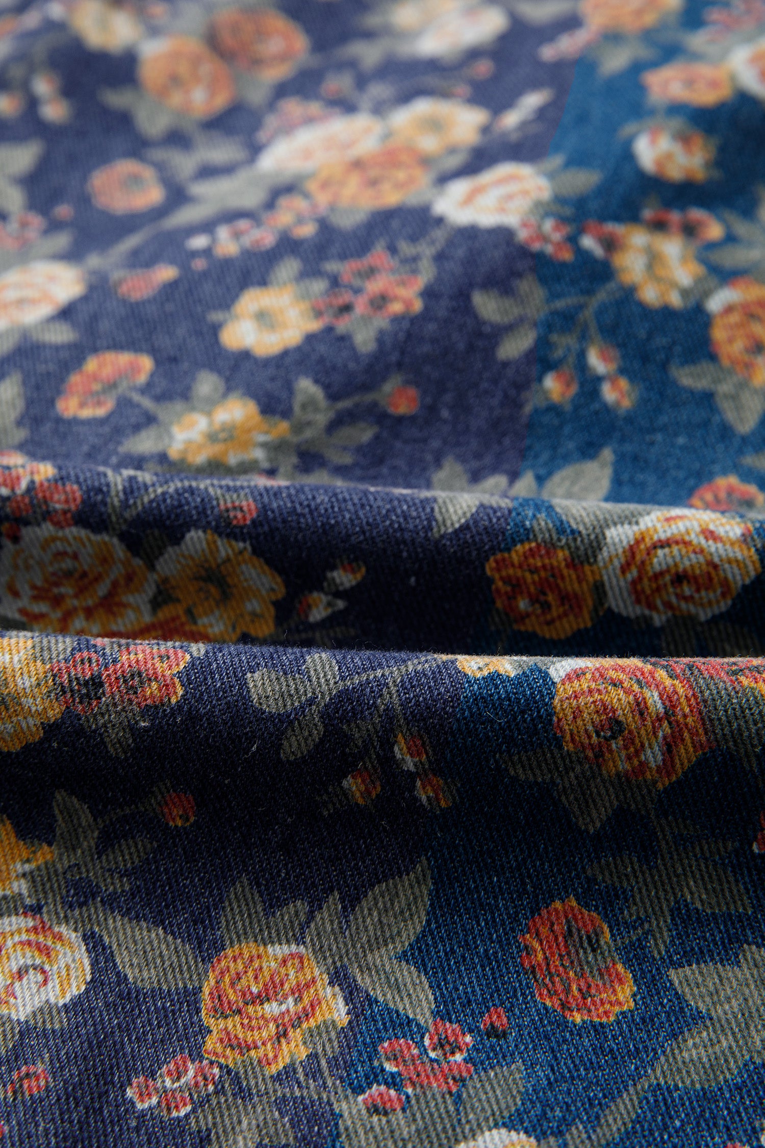 Shop Blue Retro Floral Print Bow Tie V-Neck Pleated Denim Romper at LivelyLooks