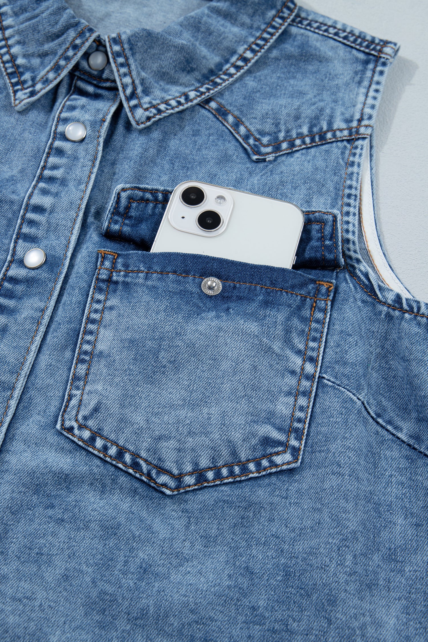 Shop Dusk Blue Buttoned Front Collared Sleeveless Denim Vest at LivelyLooks