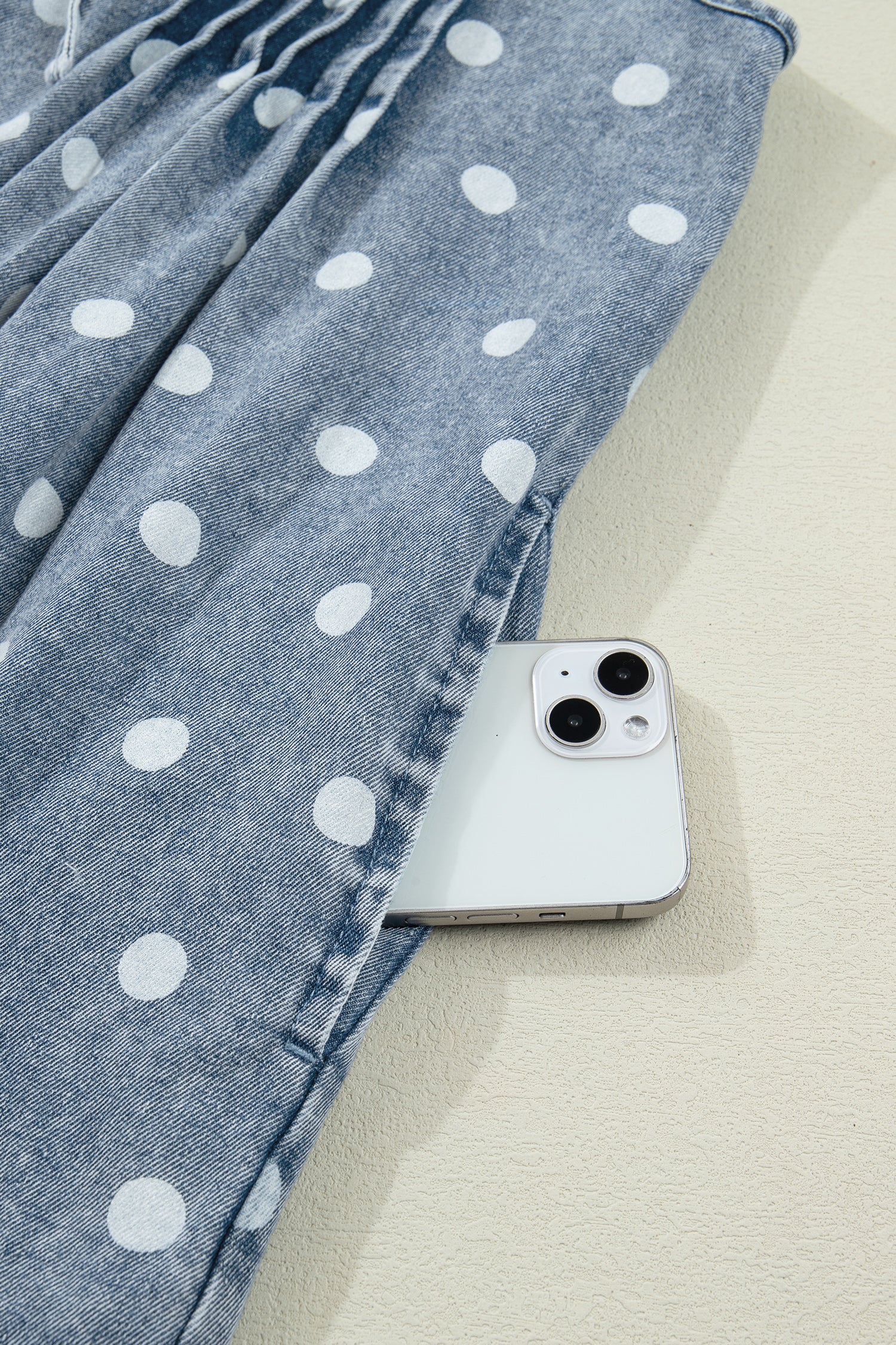Shop Sky Blue Polka Dot Denim Romper | Tie V-Neck Pleated Loose Playsuit at LivelyLooks
