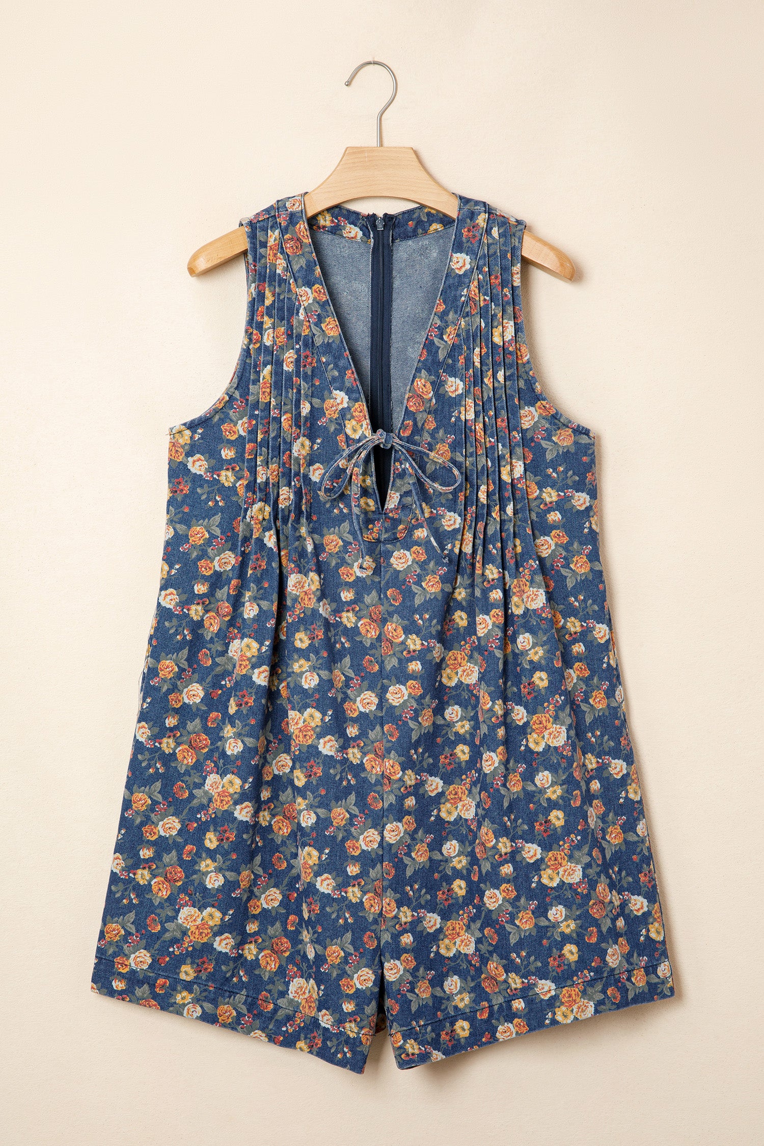 Shop Blue Retro Floral Print Bow Tie V-Neck Pleated Denim Romper at LivelyLooks