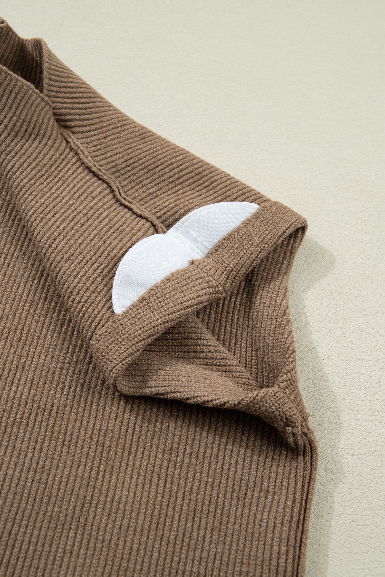 Women's Light French Beige Solid Color Ribbed Knit Mock Neck Loose Sleeveless Sweater at LivelyLooks