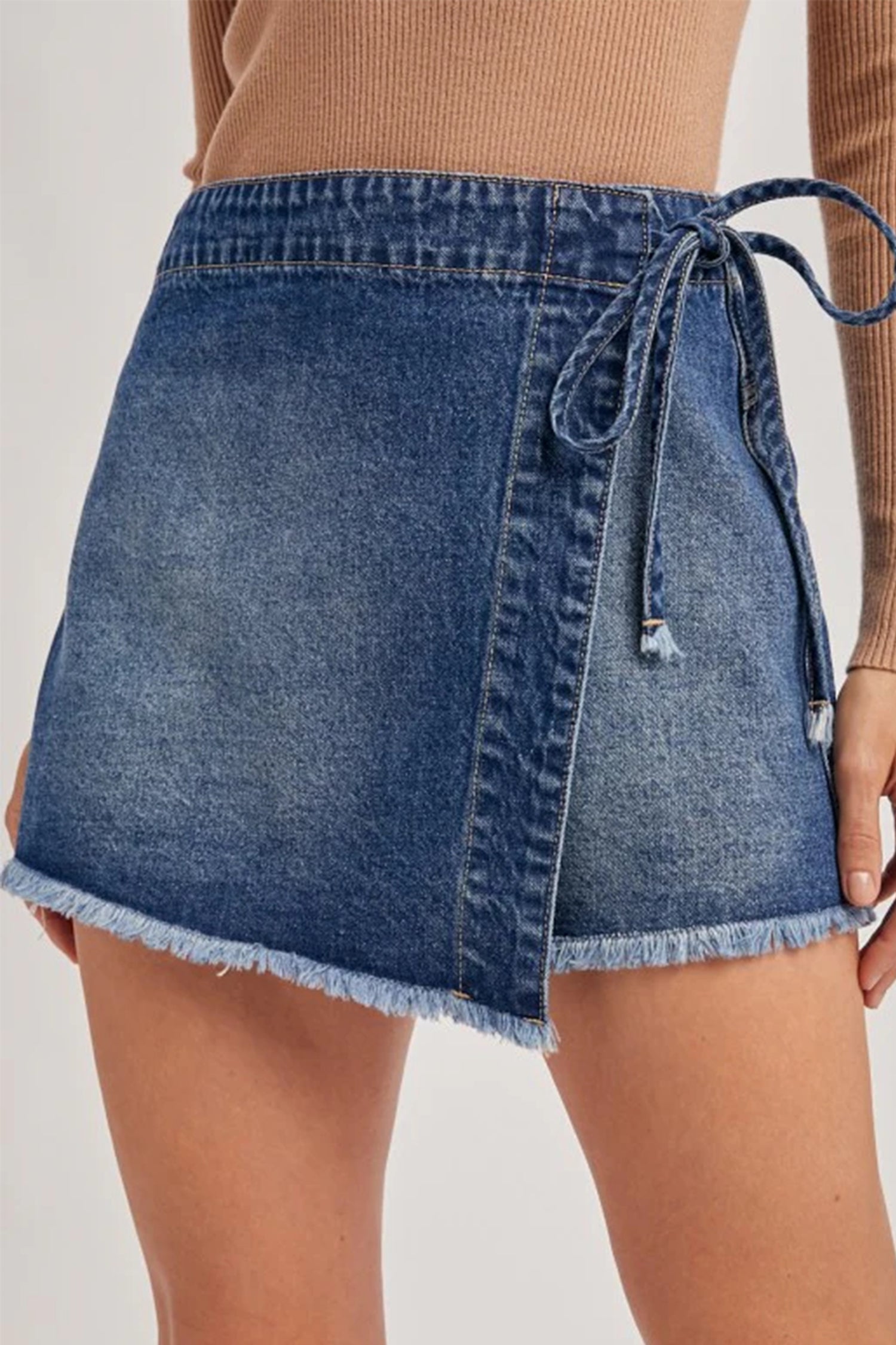Shop Ashleigh Blue Wrapped Tied Waist Denim Skort at LivelyLooks