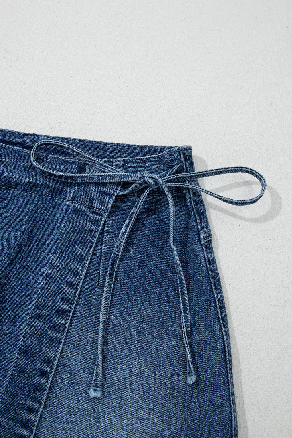 Shop Ashleigh Blue Wrapped Tied Waist Denim Skort at LivelyLooks