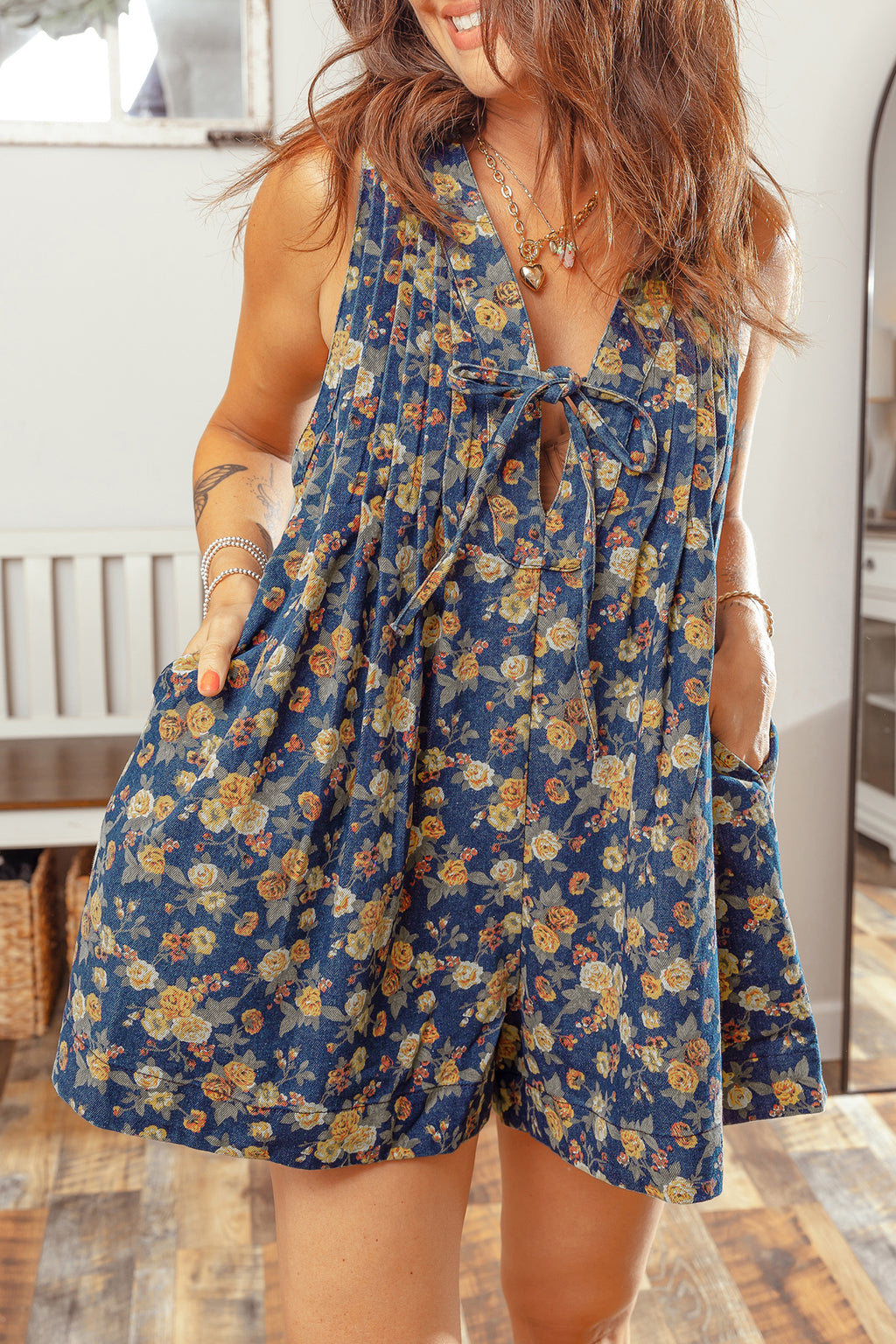 Shop Blue Retro Floral Print Bow Tie V-Neck Pleated Denim Romper at LivelyLooks