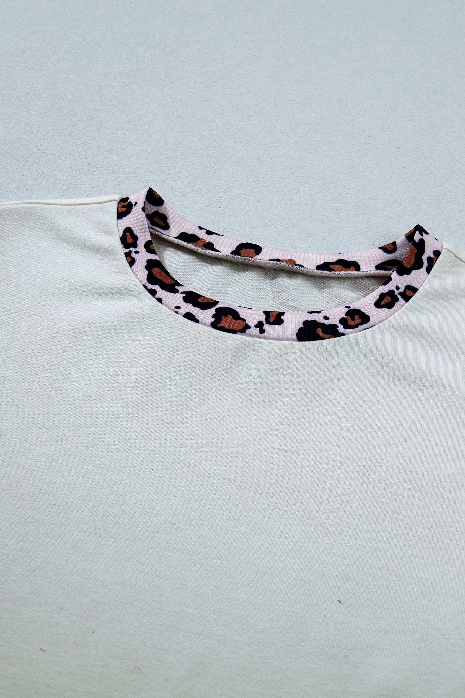 LivelyLooks White Ribbed Leopard Patchwork Uneven Hem T-Shirt women's fashion