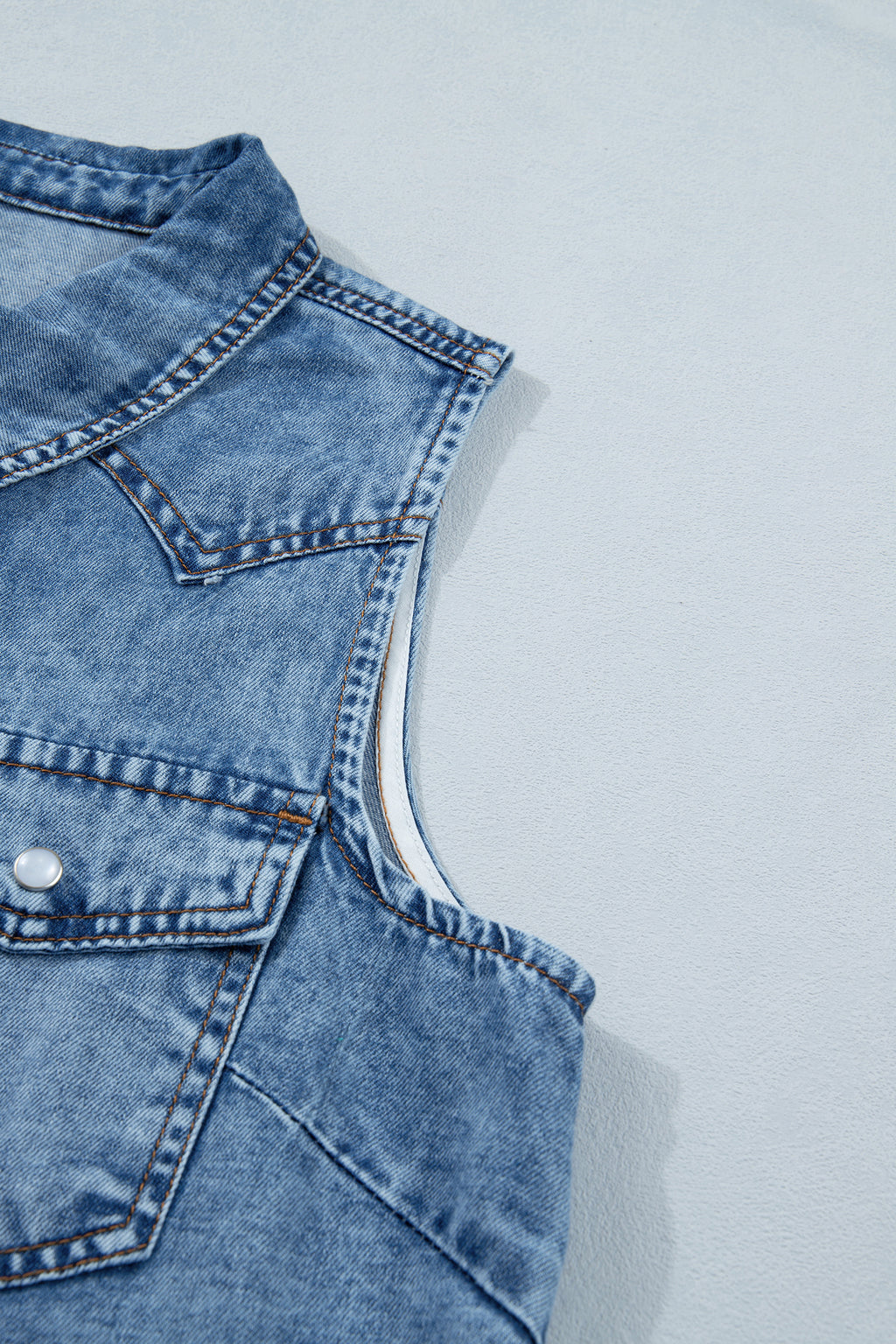 Shop Dusk Blue Buttoned Front Collared Sleeveless Denim Vest at LivelyLooks