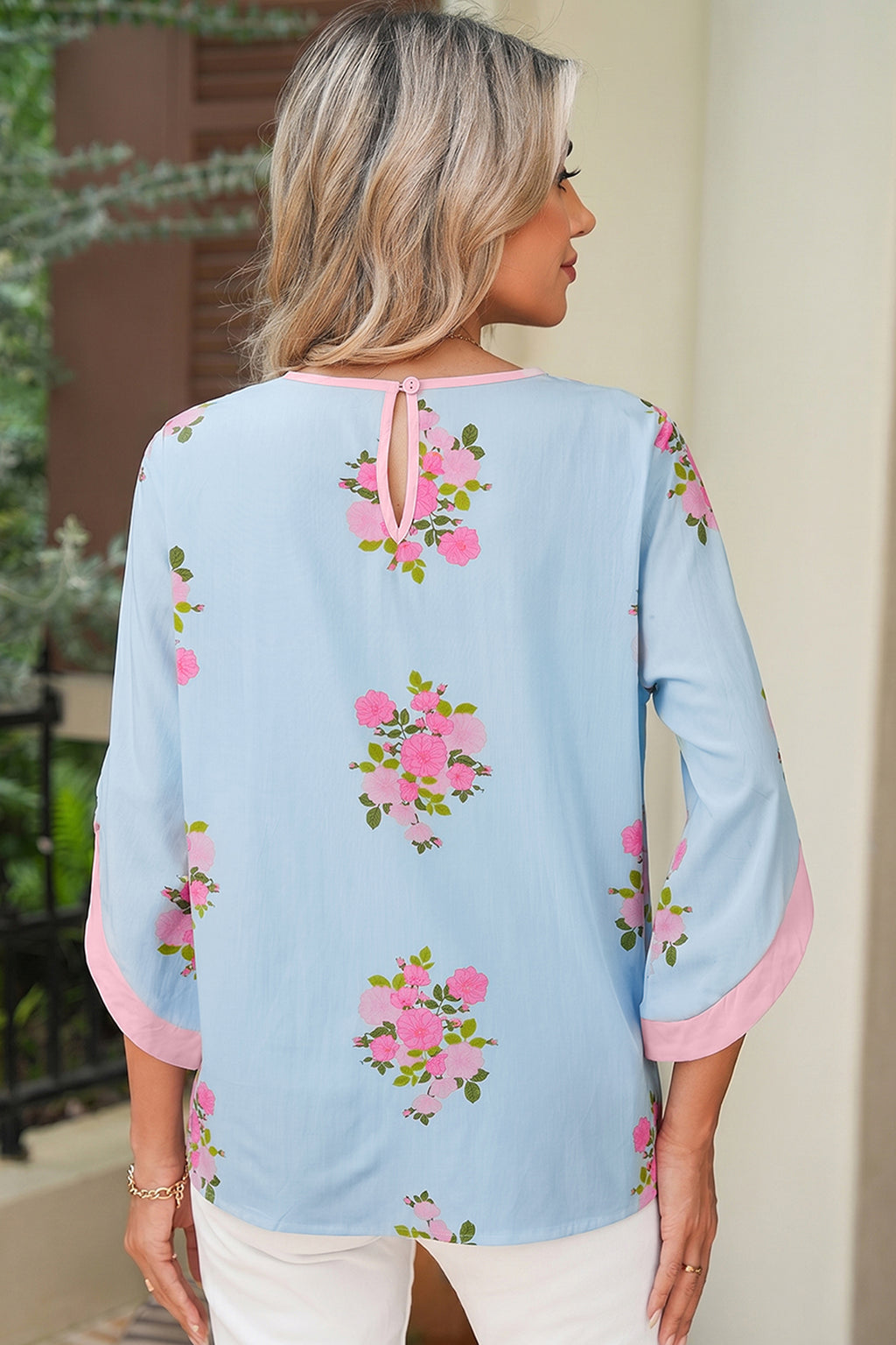 Women's Sky Blue Floral Print Button Cuff 3/4 Sleeve Round Neck Blouse at LivelyLooks