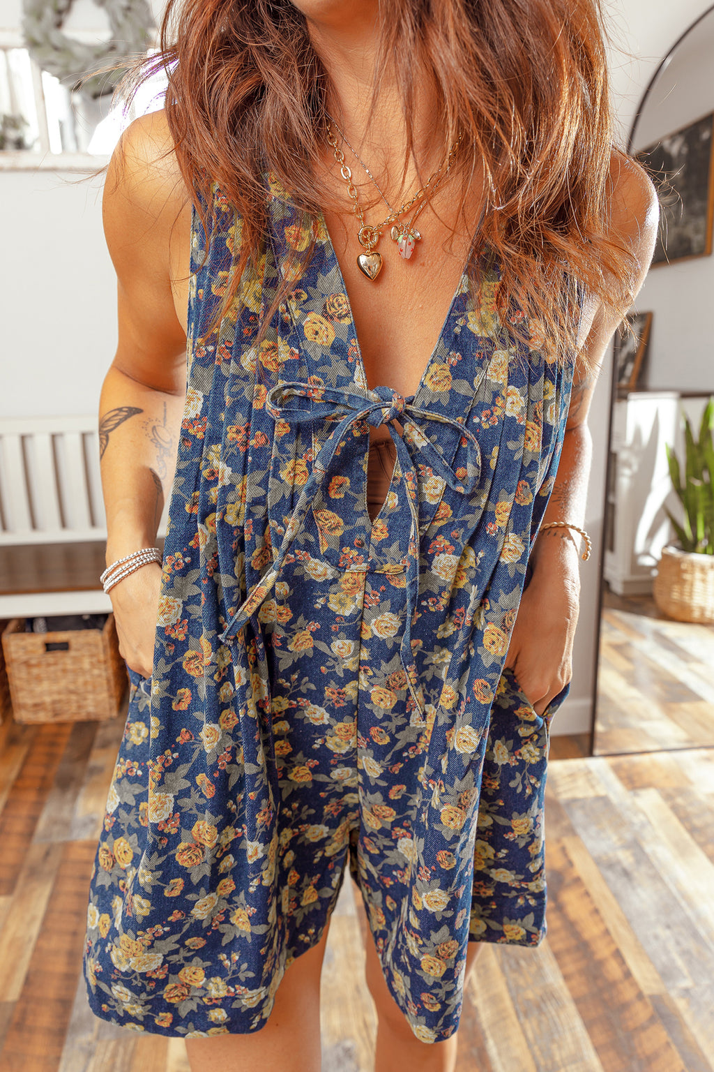 Shop Blue Retro Floral Print Bow Tie V-Neck Pleated Denim Romper at LivelyLooks