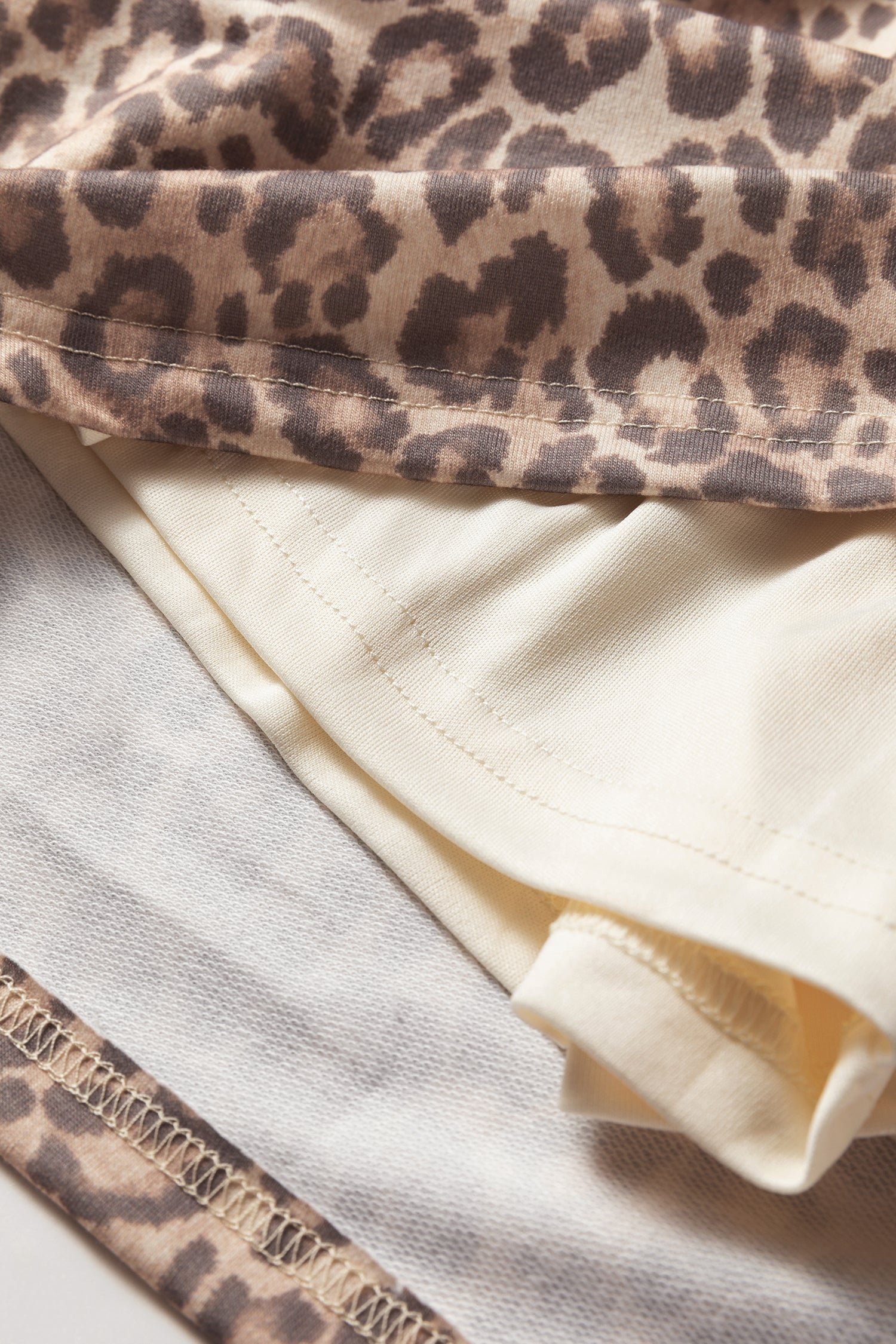 Women's Beige Leopard Print V-Neck Pullover & Mini Skirt Set Women's S-XL at LivelyLooks