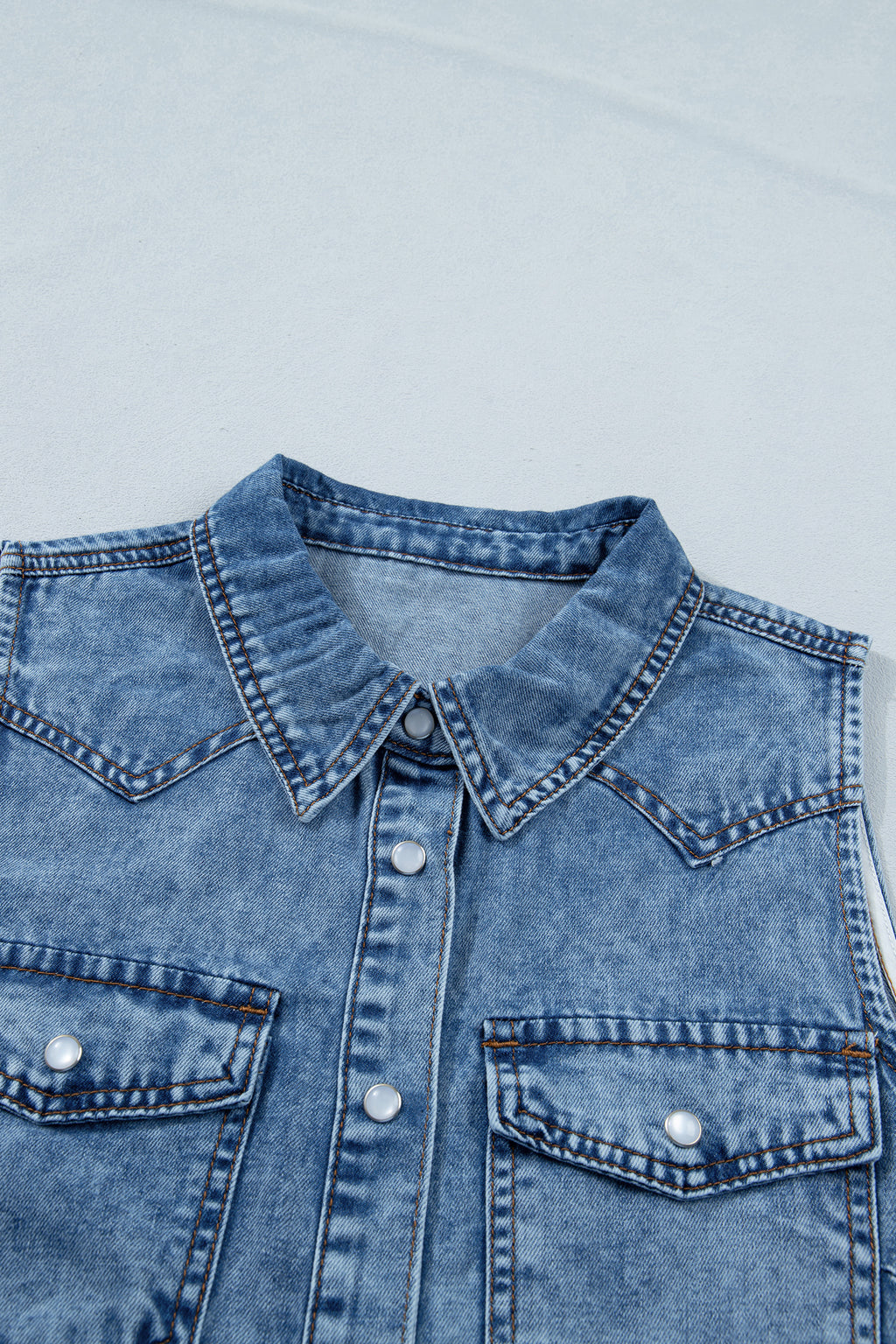 Women's Dusk Blue Buttoned Front Collared Sleeveless Denim Vest at LivelyLooks