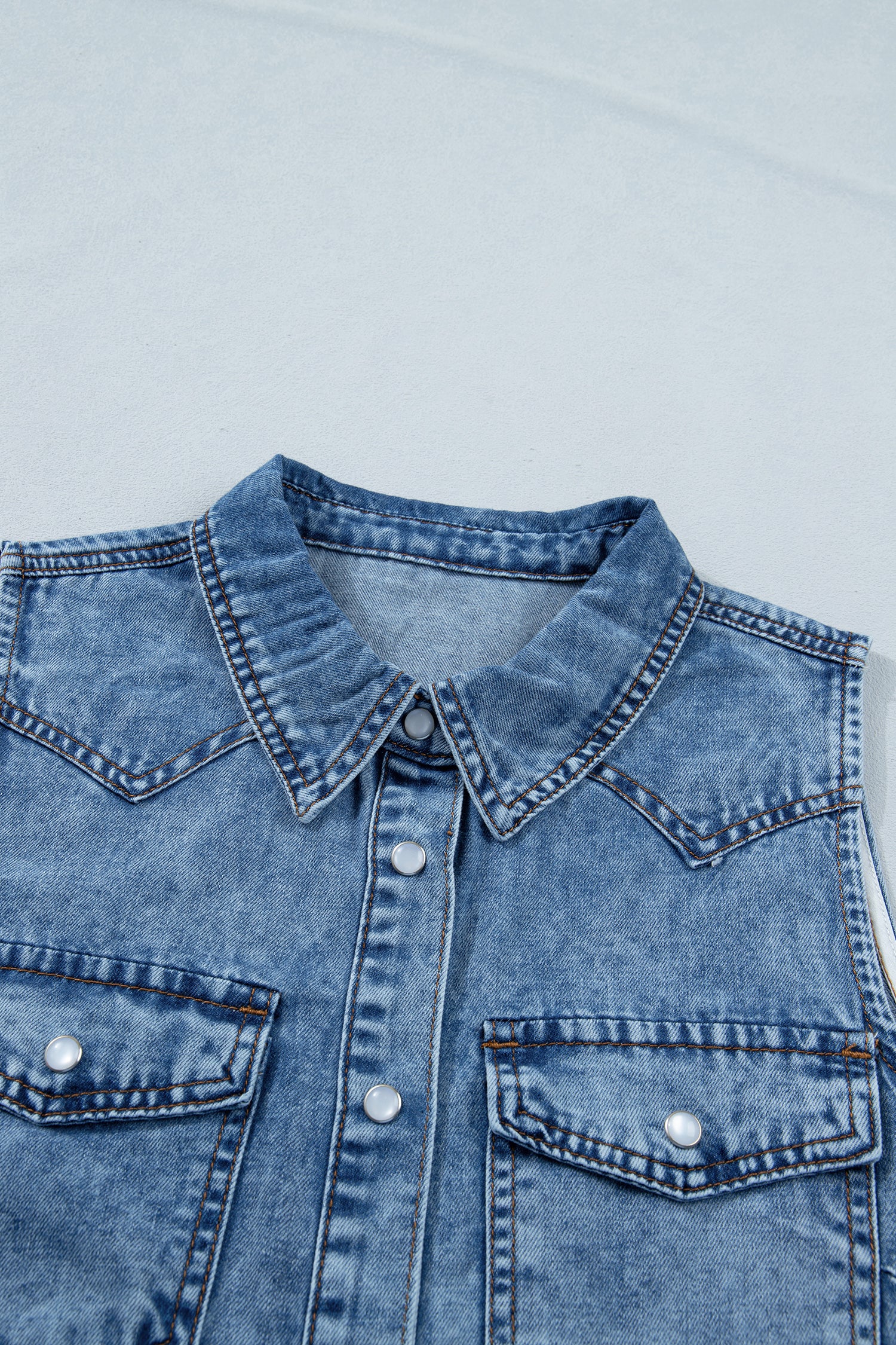 Women's Dusk Blue Buttoned Front Collared Sleeveless Denim Vest at LivelyLooks