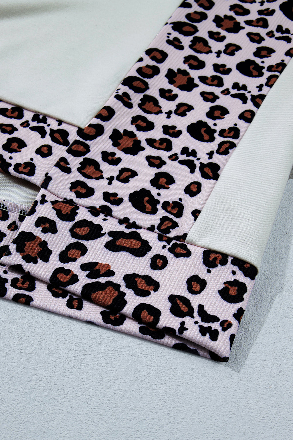 LivelyLooks White Ribbed Leopard Patchwork Uneven Hem T-Shirt women's fashion
