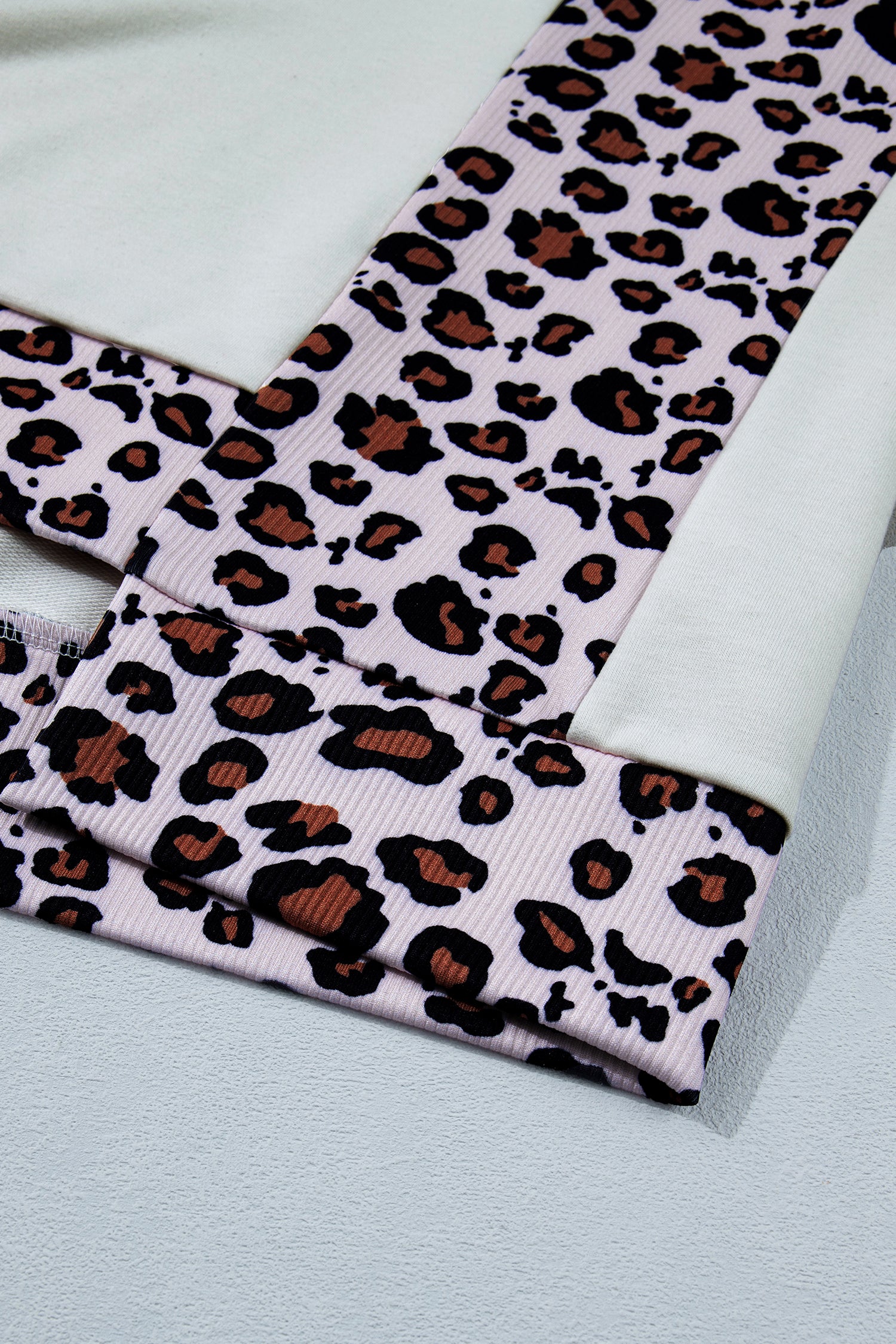 LivelyLooks White Ribbed Leopard Patchwork Uneven Hem T-Shirt women's fashion
