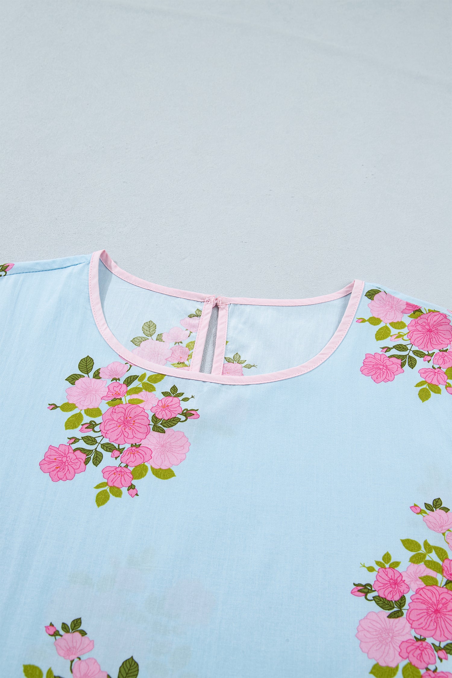 Women's Sky Blue Floral Print Button Cuff 3/4 Sleeve Round Neck Blouse at LivelyLooks