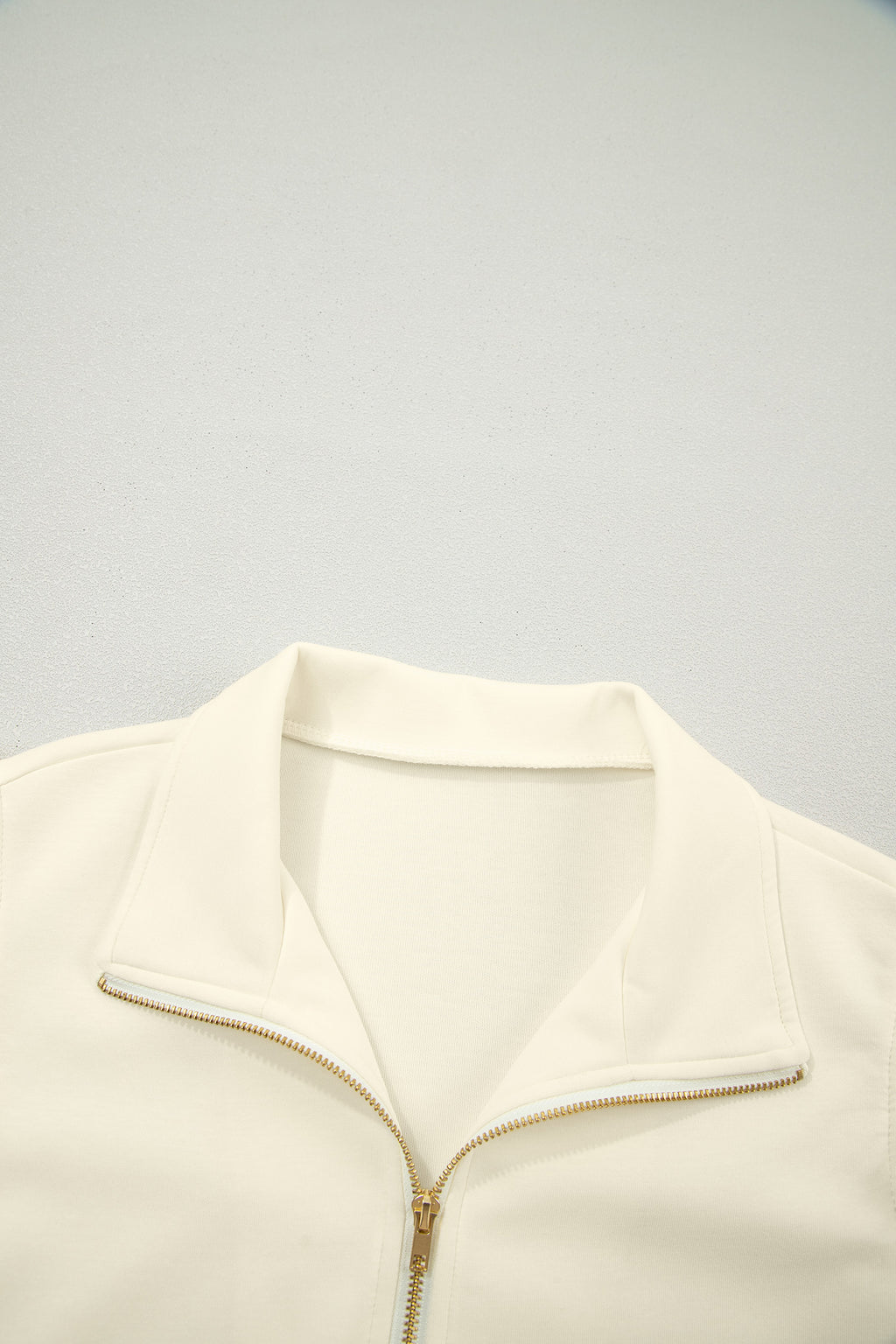Shop Zip-Up Collared Ruffled Short Sleeve Blouse at LivelyLooks