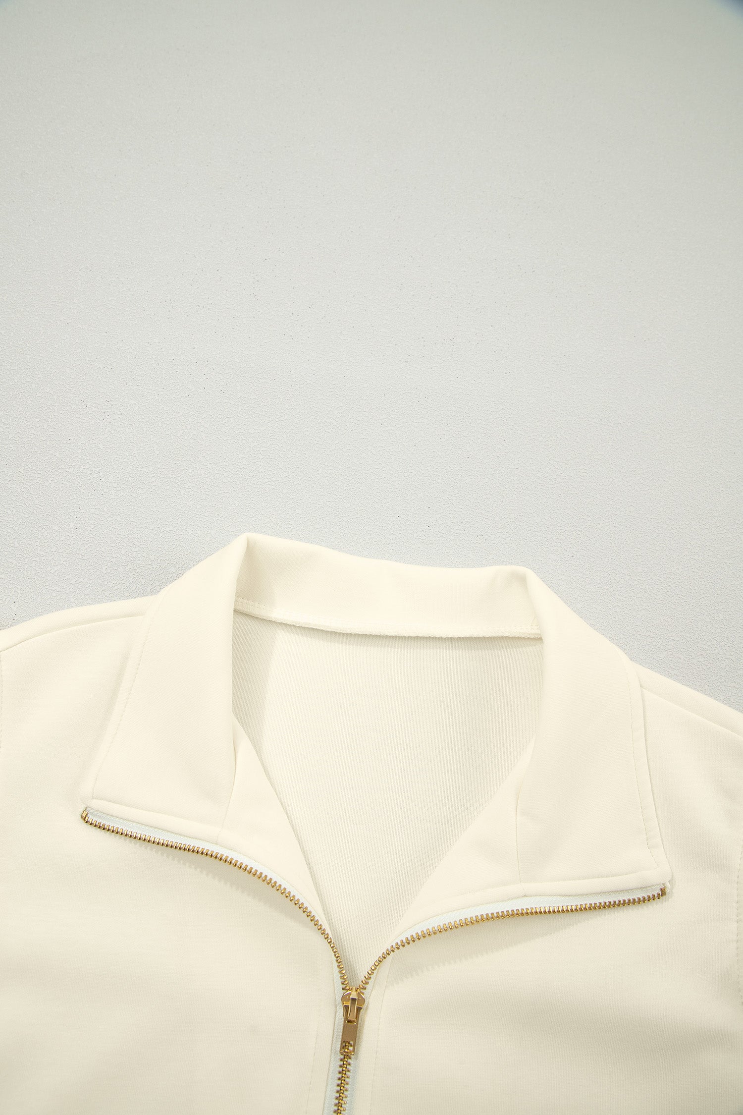 Shop Zip-Up Collared Ruffled Short Sleeve Blouse at LivelyLooks