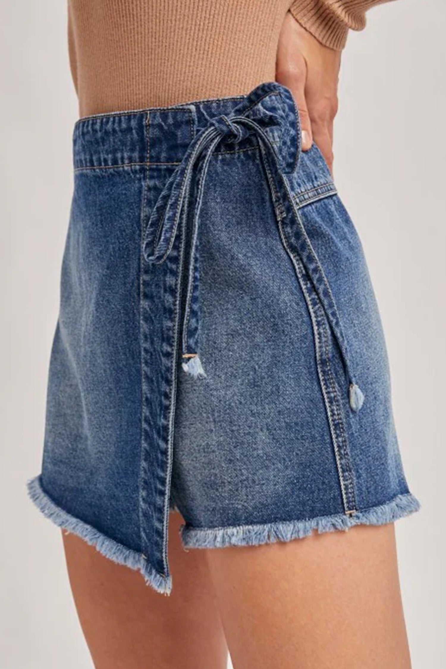 Shop Ashleigh Blue Wrapped Tied Waist Denim Skort at LivelyLooks