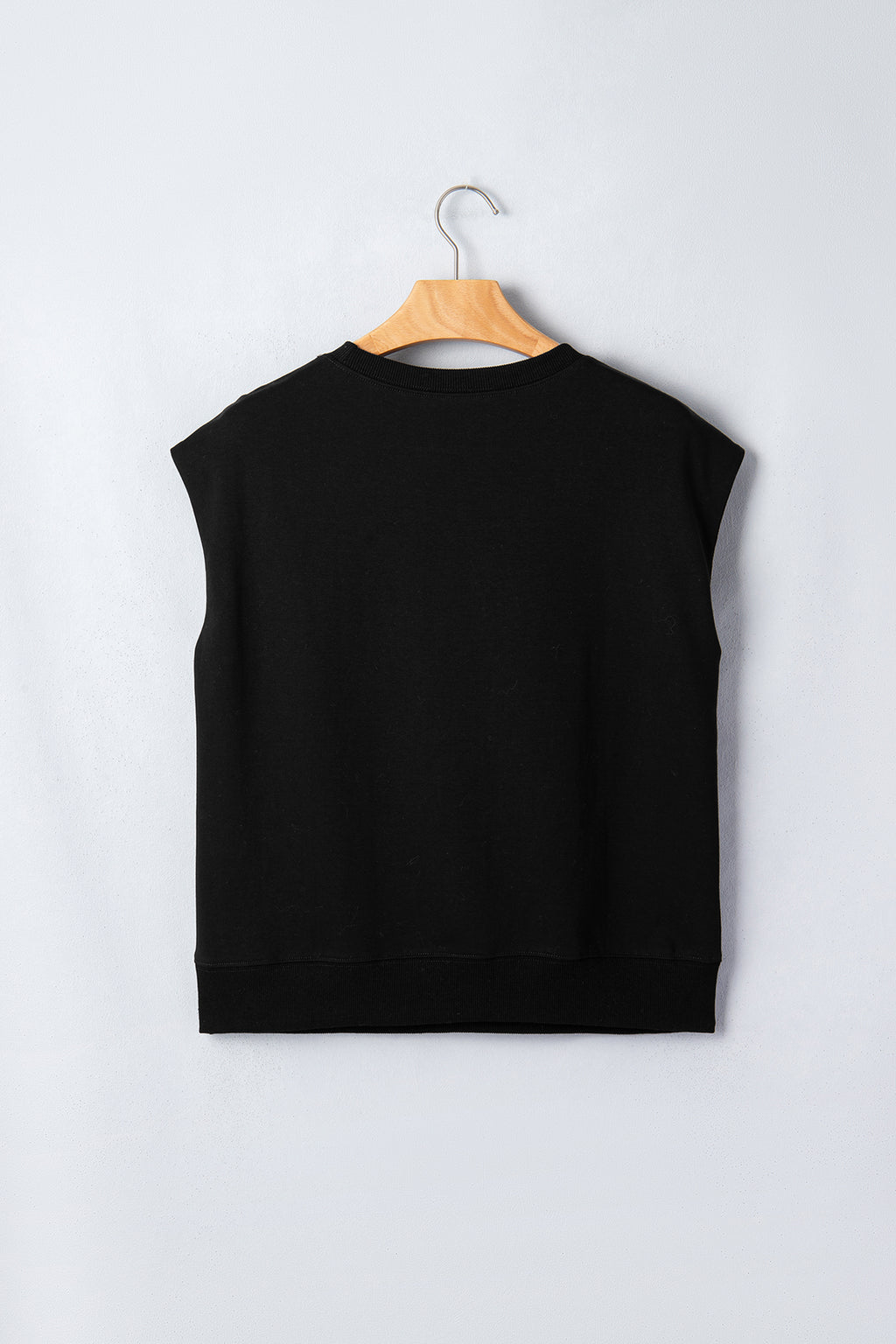 Women's Black Casual Solid Short Sleeve Top with Metal Button Details at LivelyLooks