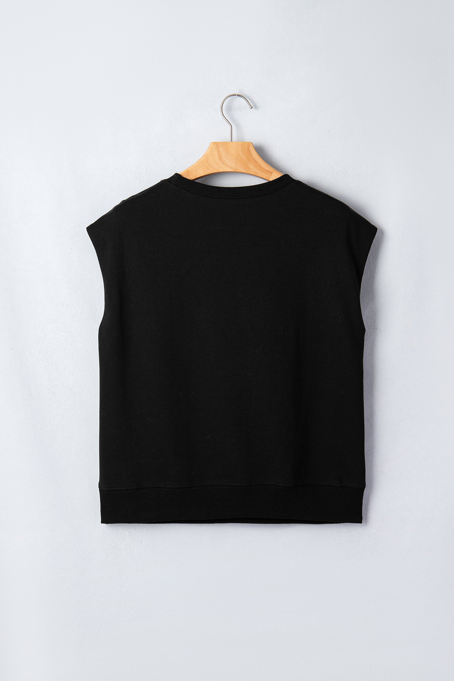 Women's Black Casual Solid Short Sleeve Top with Metal Button Details at LivelyLooks