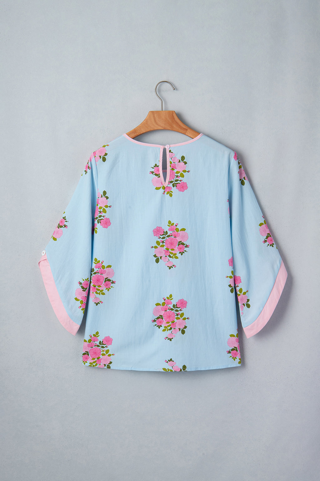 Women's Sky Blue Floral Print Button Cuff 3/4 Sleeve Round Neck Blouse at LivelyLooks