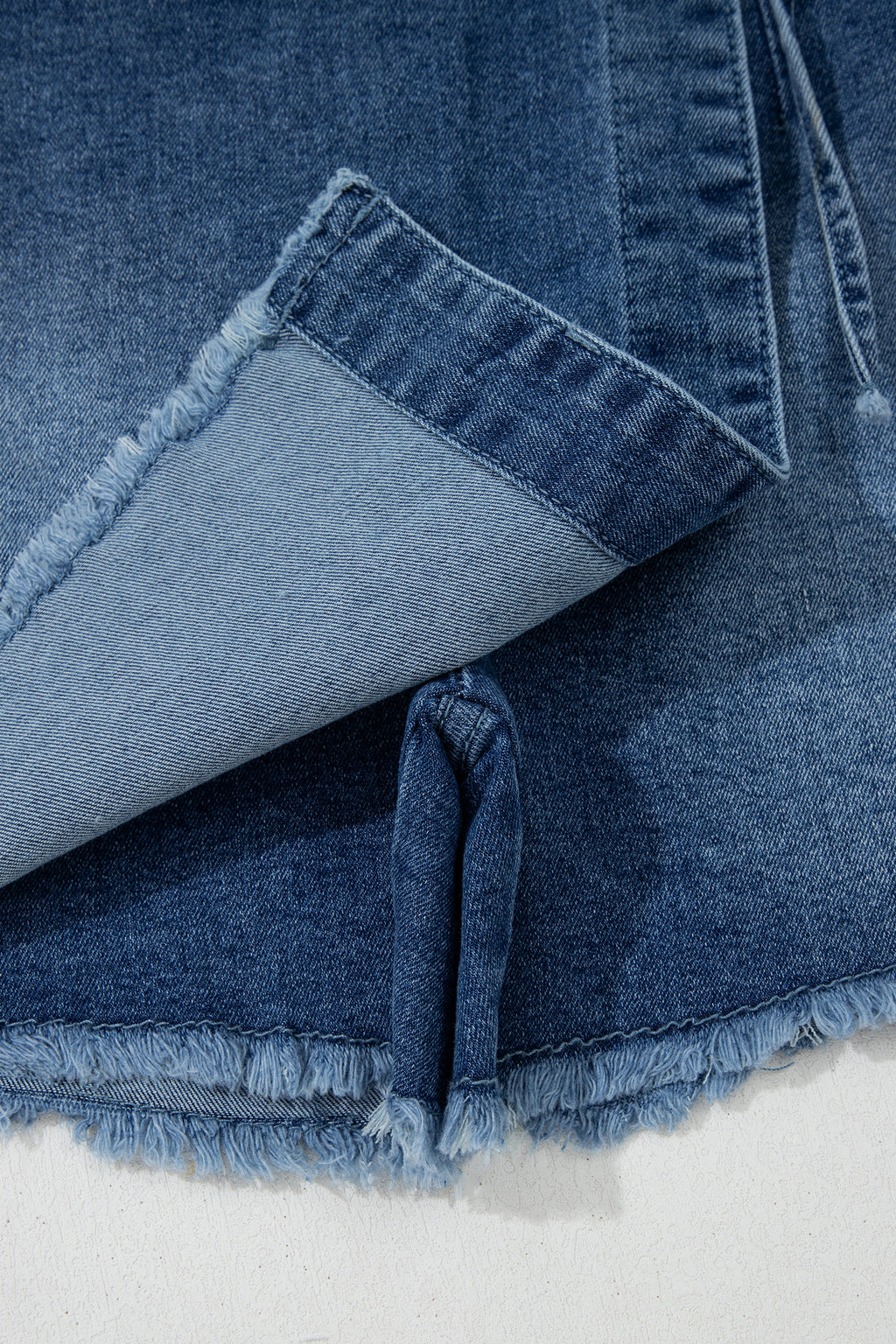 Shop Ashleigh Blue Wrapped Tied Waist Denim Skort at LivelyLooks