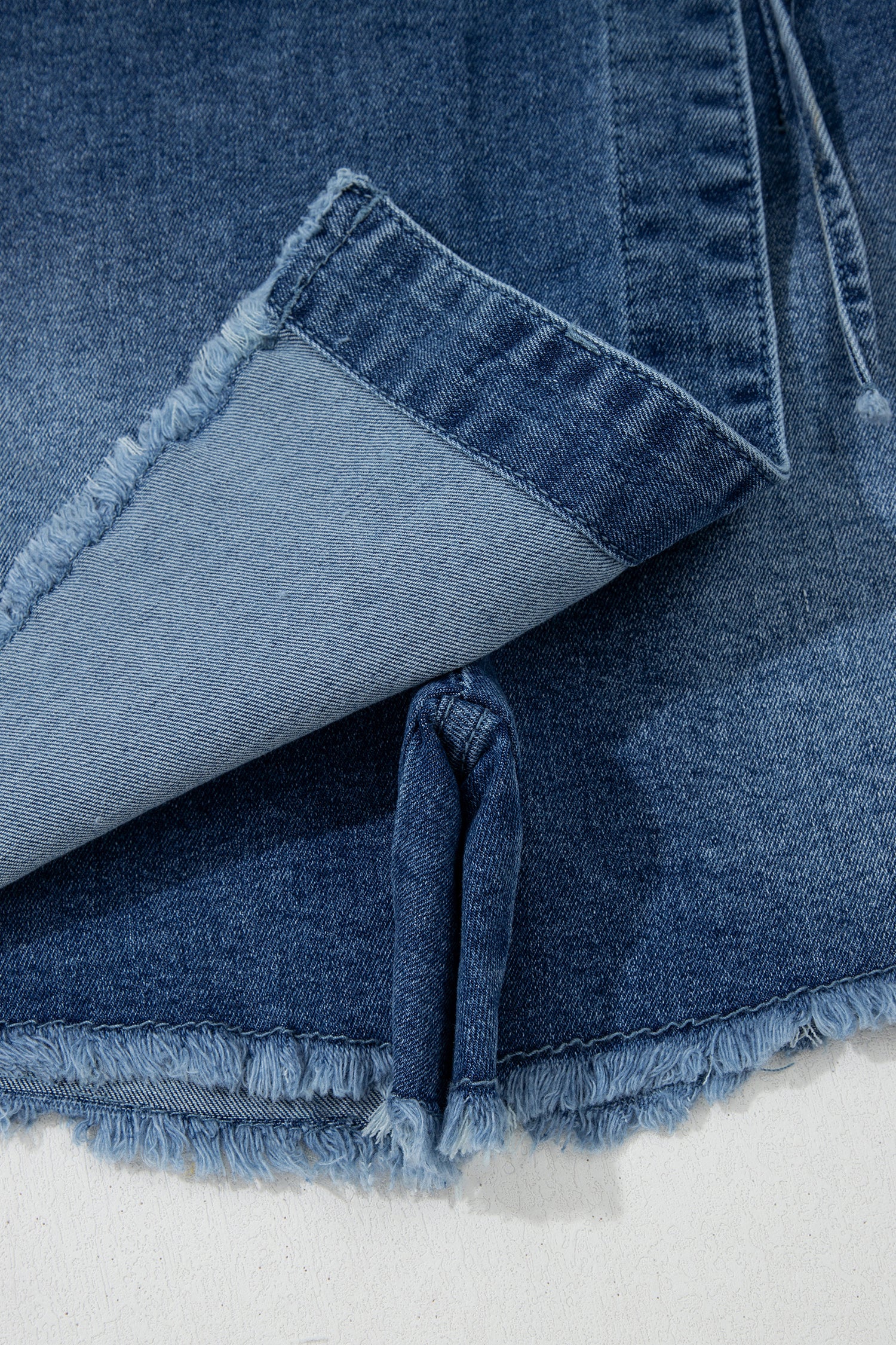 Shop Ashleigh Blue Wrapped Tied Waist Denim Skort at LivelyLooks