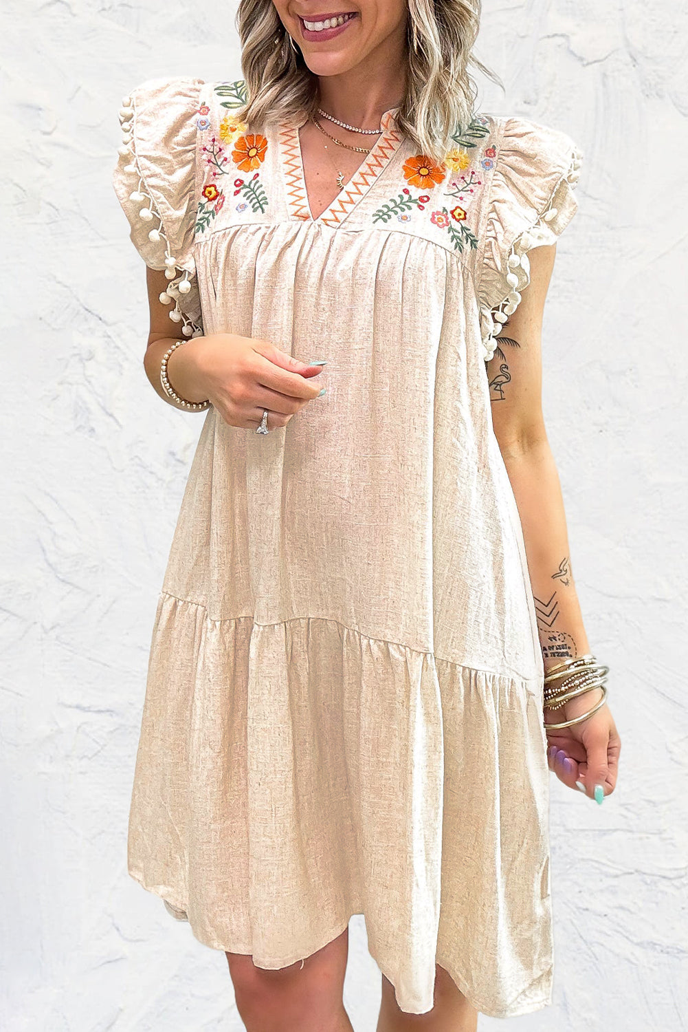 Shop Floral Embroidery Pom Pom Ruffle Sleeve Split Neck Mini Dress | S-XL at LivelyLooks