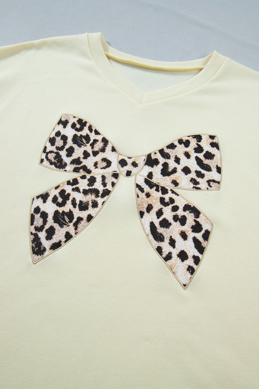 Shop White Black Leopard Bow V Neck Tee & Drawstring Shorts Set 2pcs S-XL at LivelyLooks