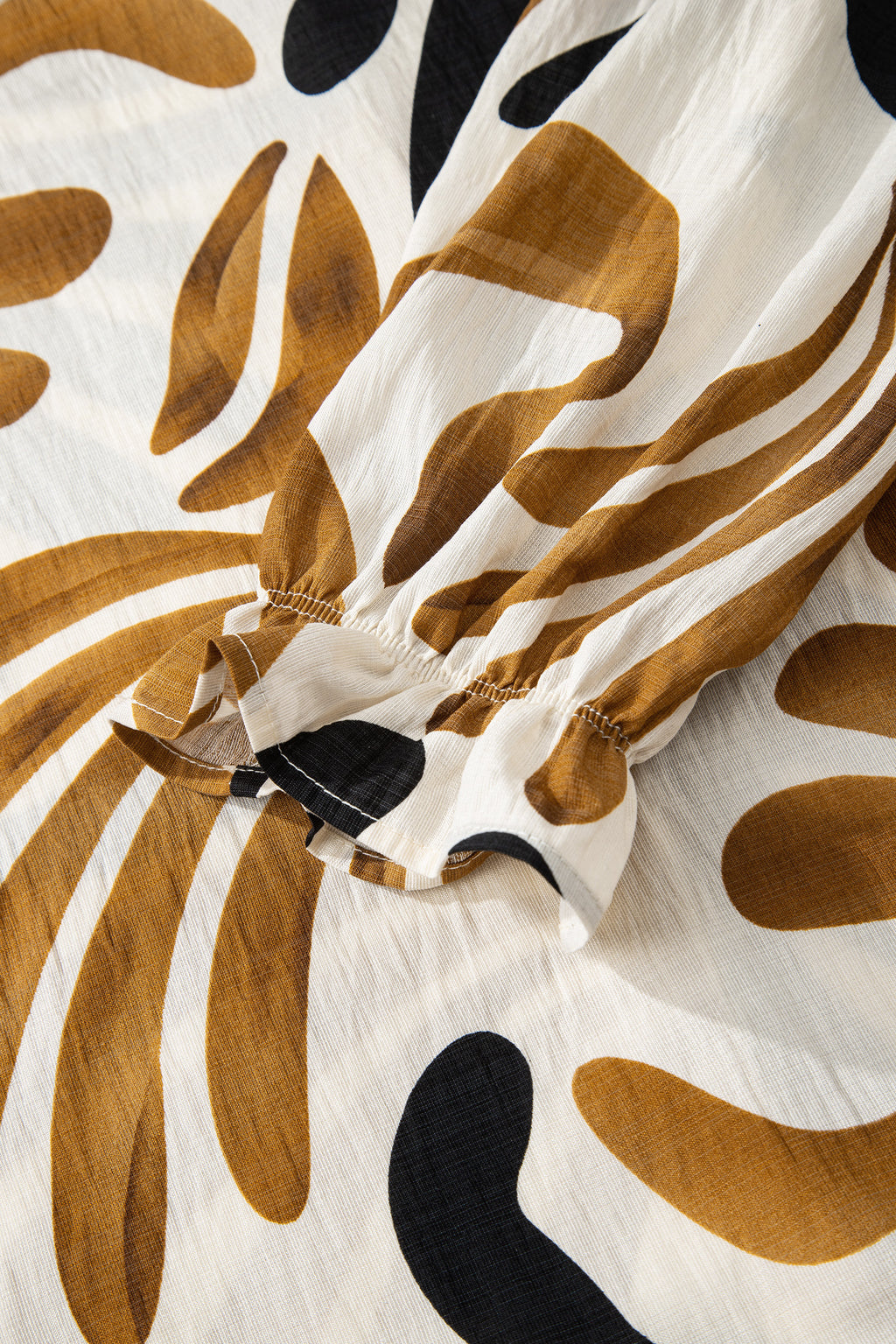 Women's Brown Tropical Printed Contrast Trim Neck Long Sleeve Ruffle Hem Dress at LivelyLooks