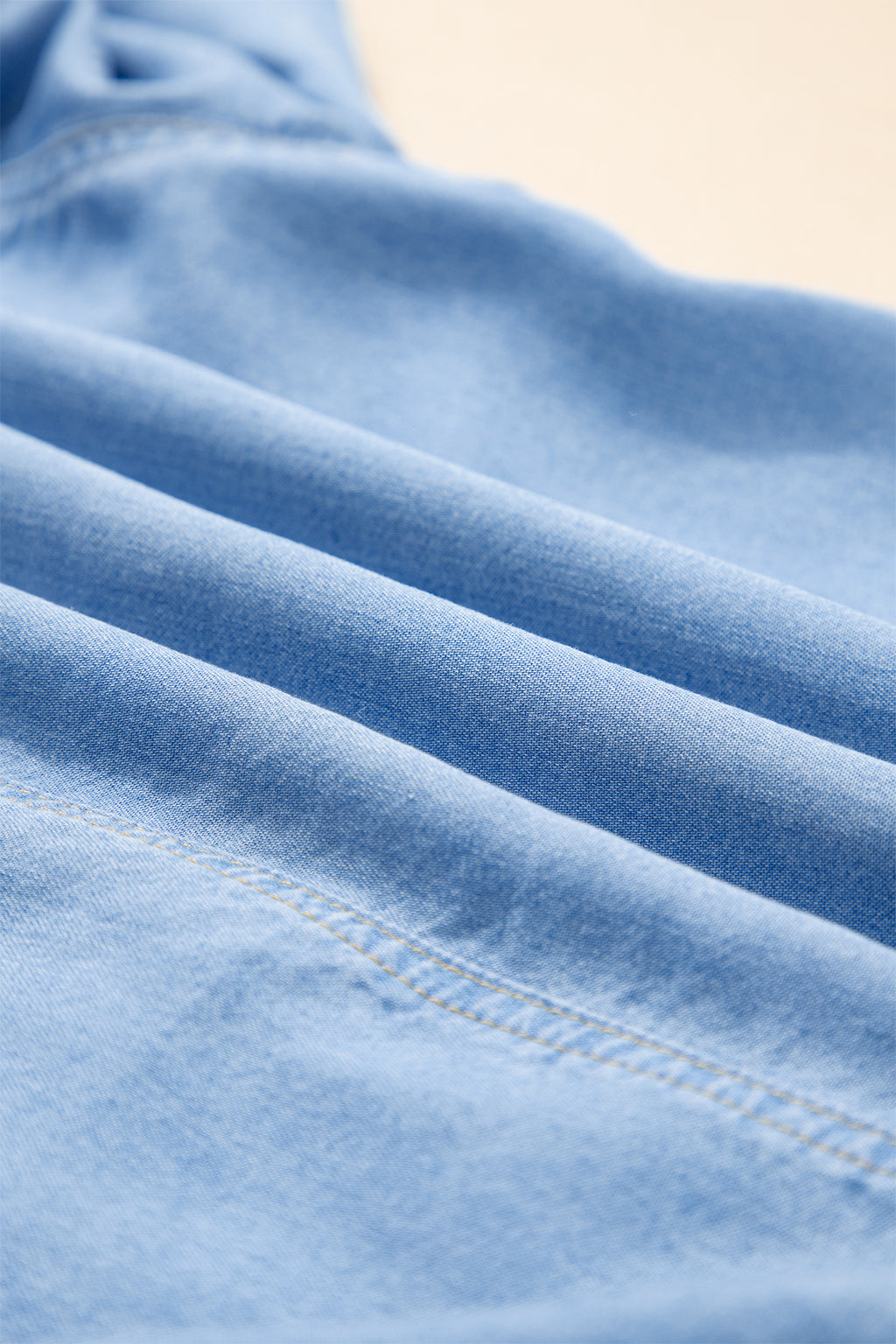 Women's Beau Blue Half Sleeve Button Down Ruffled High Low Chambray Shirt at LivelyLooks