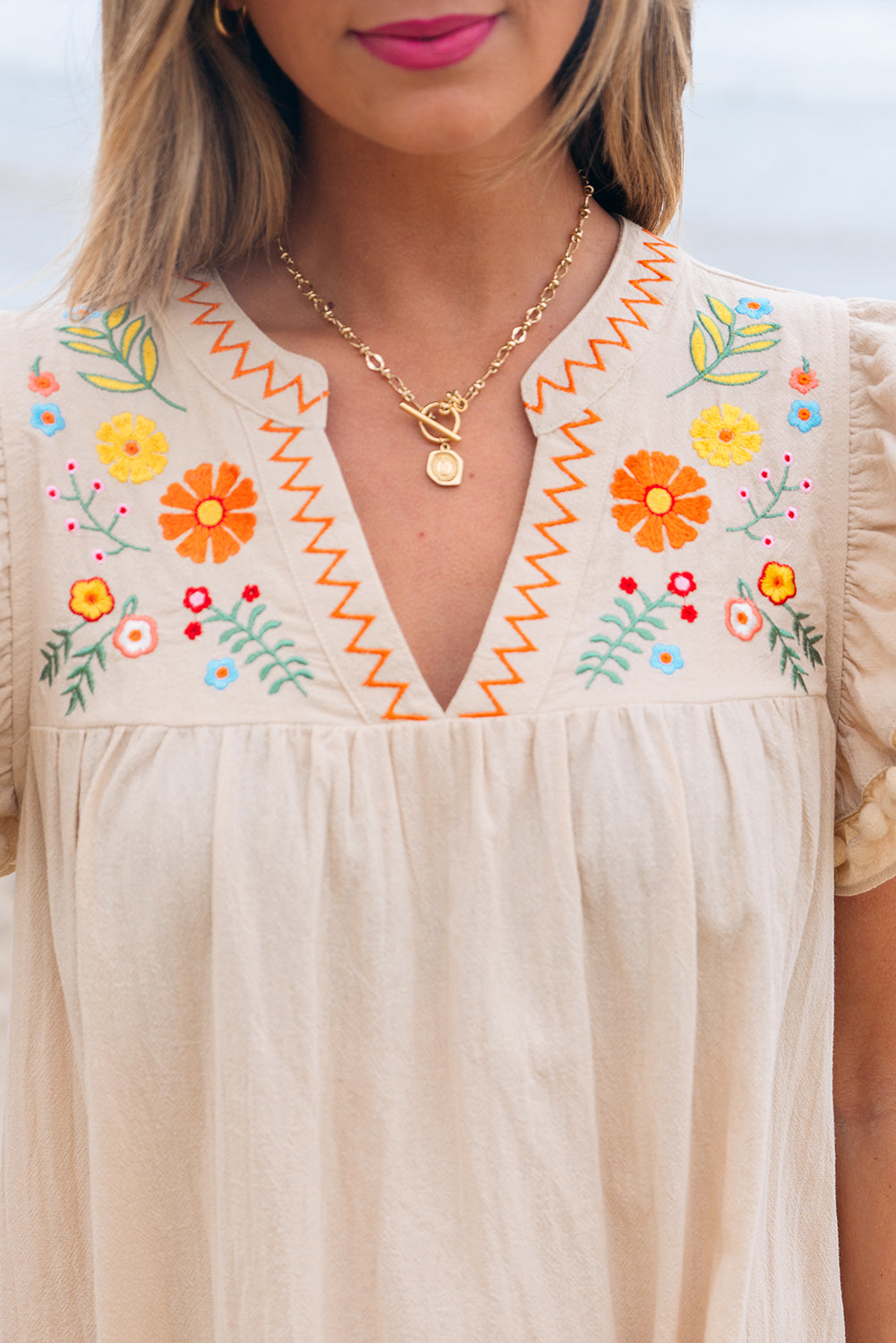 Shop Floral Embroidery Pom Pom Ruffle Sleeve Split Neck Mini Dress | S-XL at LivelyLooks